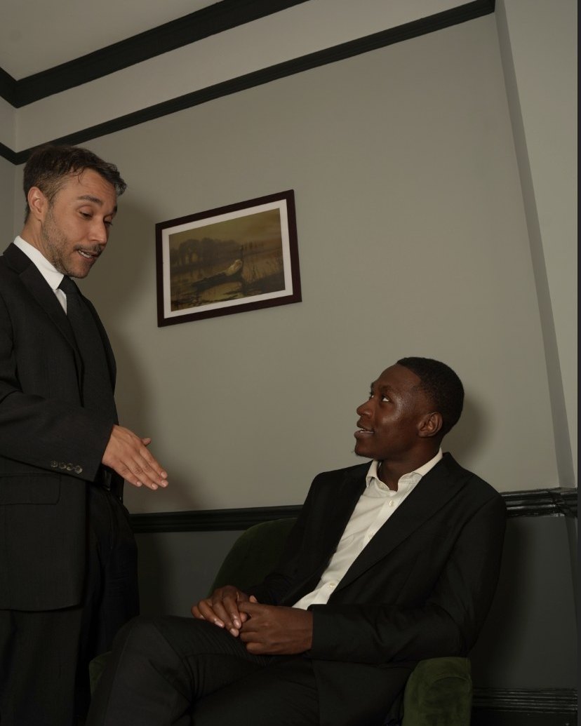 Two Wilton Property Partners team members in conversation.